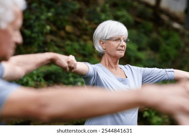 Meditation, holding hands and peace with old woman in circle in yoga class for spiritual retreat, health and zen. Wellness, fitness and connection with senior people in nature for balance and pilates - Powered by Shutterstock