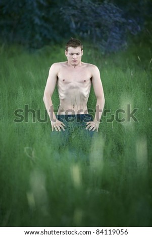 Similar – sports guy in his underwear looking at the river