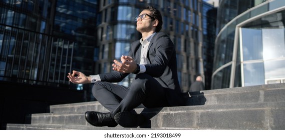 Meditation Yoga Relieved Stress By A Man In A Business Suit