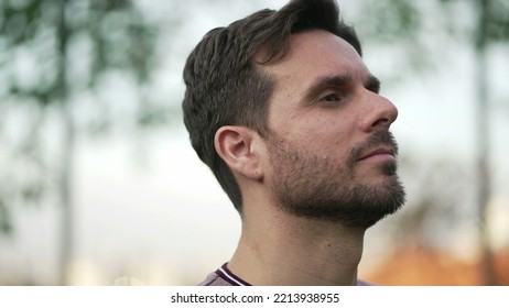 Meditative Man Standing Outdoors Opening Eyes To Sky Feeling FREE. Contemplative Person Breathing Outside