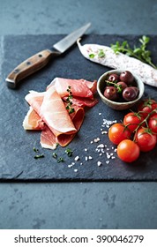 Mediterranean Antipasto On A Black Slate