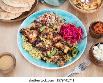 Mediterranean Chicken Kabobs With Rice And Fresh Organic Vegetables. A Healthy And Delicious Greek Cuisine Lunch. 