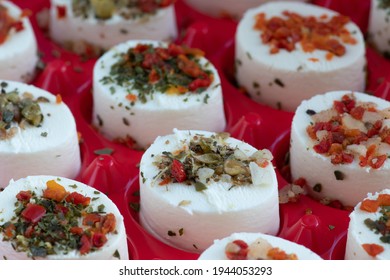 Mediterranean Diet Cream Cheese Bites. Soft Cheese With Herbs Tomato Red Pepper Onion And Garlic Appetiser Platter. One Bite Appetizers Idea. 