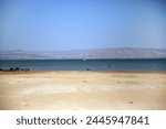 Mediterranean, Galilee. Kinneret Lake in Israel in the summer. Freshwater Lake in the Middle East. Kinneret lake view. Water, shore, bay, coast, bay, sand