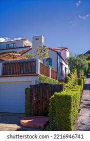 Mediterranean Hillside Home under Blue Skies. - Shutterstock ID 2216946741