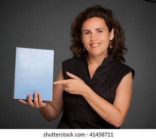 Mediterranean Looking Woman Holding A Blank Box;