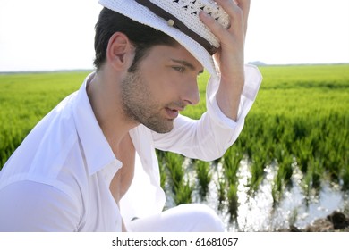 Mediterranean Man Portrait White Hat In Green Meadow Rice Field