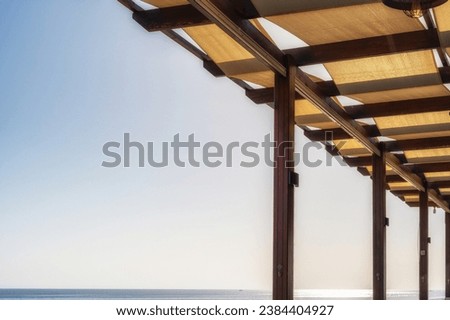 Mediterranean roof construction to provide shade with free text space in the sky