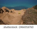 Mediterranean sea in spring.  Deserted shorekurkar sandstone cliff nature reserve, high above the Mediterranean sea coastline between Herzliya and Netanya towns, Israel.