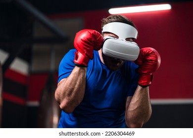 Medium Close Up And Motion Blur Of Sport Man Wearing VR Headset To Exercise With Simulation Boxing Games, Young Man Athlete Boxer Virtual Reality Combat Experience Activity. New Experience Lifestyle.