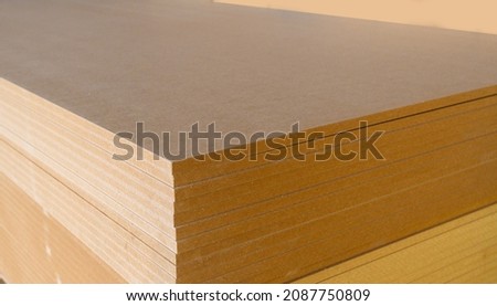 Medium Density Fiberboard (MDF)in the workshop-selective focus.