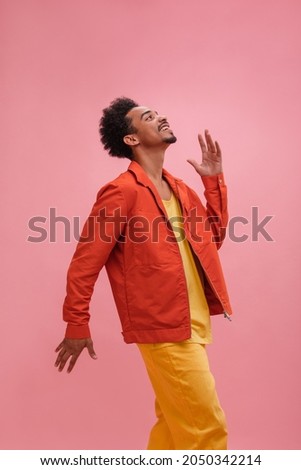 Similar – Image, Stock Photo Man in Orange Jacket Enjoying Misty Iceland Landscape
