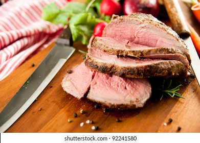 Medium Rare Cooked Beef Roast With Vegetables And Spices