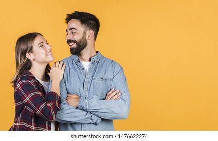Medium shot couple looking at each other - Shutterstock ID 1476622274