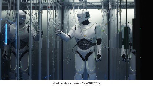 Medium shot of a humanoid robot checking servers in a data center