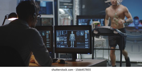 Medium Shot Of A Male Astronaut Running On A Treadmill During A Pre-flight Test