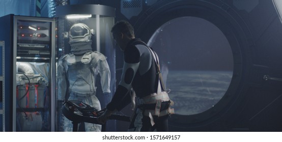 Medium Shot Of A Male Astronaut Running On A Treadmill In A Space Station