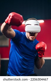 Medium Shot And Motion Blur Of Sport Man Wearing VR Headset To Exercise With Simulation Boxing Games, Young Man Athlete Boxer Virtual Reality Combat Experience Activity. New Experience Lifestyle.