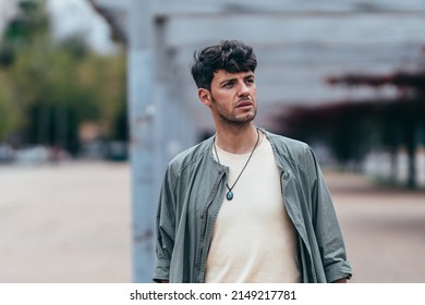 Medium Shot Portrait Of A Dark-haired Caucasian Man With An Intense Stare