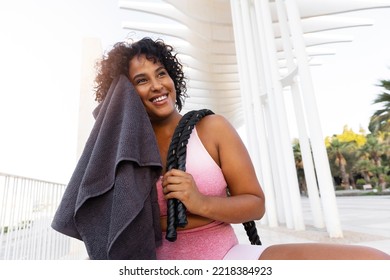 Medium Shot Smiley Woman Holding Towel