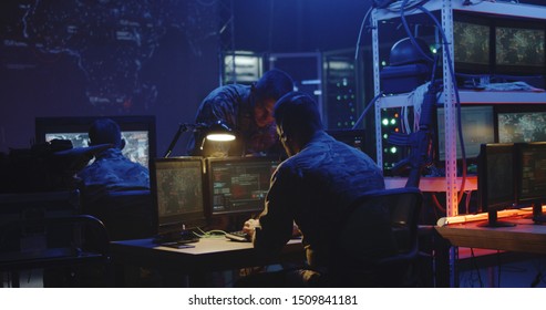 Medium Shot Of A Soldier Working On A Computer