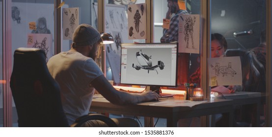 Medium Shot Of A Young Man Modeling An Airplane On Computer