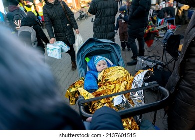 Medyka, Poland - March 17, 2022: Refugees From Ukraine Arriving At Ukrainian-Polish Border Crossing In Medyka. People Fleeing The War In Ukraine