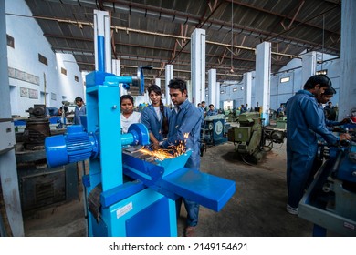 Meerut, Uttar Pradesh, India- April 22 2015: Student Learning Lathe Machine During Industrial Training Class At Government Industrial Training Institute In Meerut.