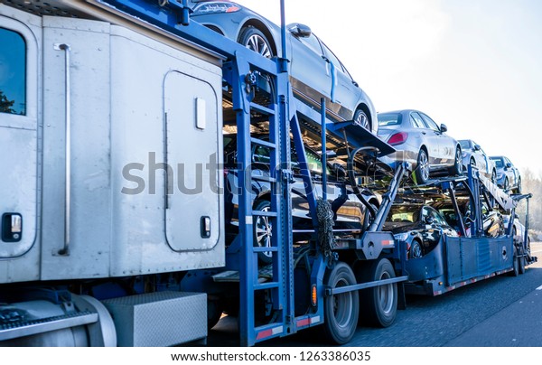 To meet the people need for passenger cars special\
big rig semi trucks are adapted to transport vehicles using mainly\
two-tiered semi trailers and transporting vehicles all around\
America and Canada