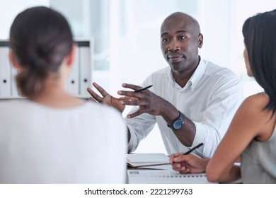 Meeting, black man and brainstorming idea with team in office for marketing project proposal. Cooperation, goal and collaboration of employees in communication for advertising campaign ideas. - Shutterstock ID 2221299763