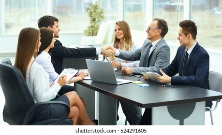 Meeting Business Partners In A Modern Office