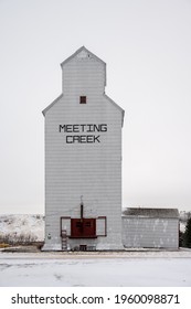 Meeting Creek, Alberta - April 11, 2021: Grain Elevators In The Small Town Of Meeting Creek.