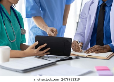 Meeting of doctors and medical personnel in hospitals to discuss research on disease treatment. - Powered by Shutterstock