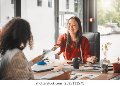 Meeting, fashion designer and team with business people in office for visual merchandiser, campaign layout and consultant. Creative director, portfolio and planning with women for boutique startup - Powered by Shutterstock