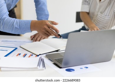 Meeting with financial advisors to analyze market growth reports and discuss financial budget expenditure scenarios in business reports. Financial planning and accounting. - Shutterstock ID 2226689083