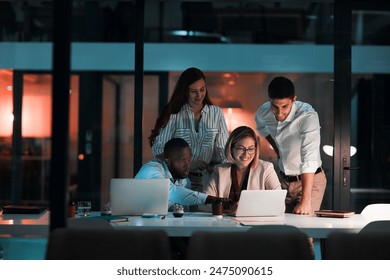 Meeting, laptop and team of business people in office at night with stock market charts for investment. Discussion, computer and financial advisors working on company profit report with deadline. - Powered by Shutterstock