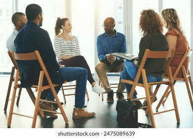 Meeting, people and collaboration sitting in office for teamwork, communication and diversity. Group, men and woman in circle discussion for company planning, brainstorming and working together - Powered by Shutterstock