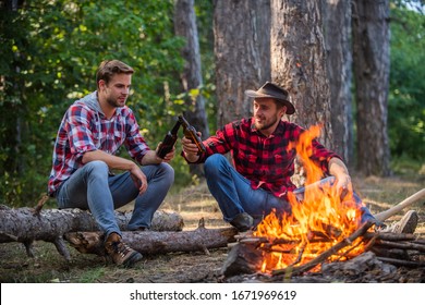 a meeting place. hiking adventure. picnic in tourism camp. happy men brothers. friends relaxing in park together. drink beer at picnic. campfire life story. spend free time together. family camping.