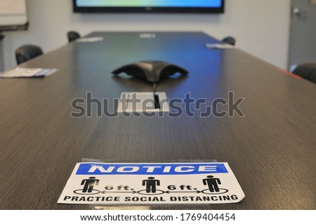 Meeting room with social or physical distancing rules