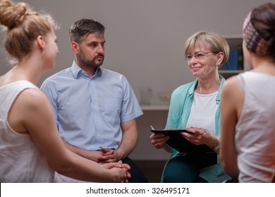 Meeting Of Support Group In Psychotherapist's Room