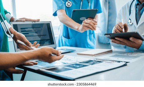 Meeting team of doctor and medical staff at hospital, Consultation about the treatment of heart disease, pneumonia, gastrointestinal and stomach diseases. and osteoporosis - Powered by Shutterstock