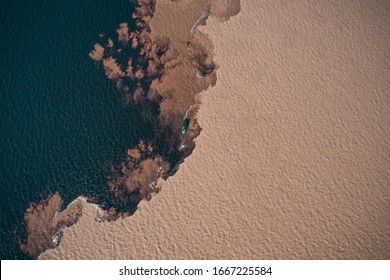 Meeting Of Waters Aerial Shot, Shows The Unusual Phenomenon At The Meeting Point Between Rio Negro And Amazon Rivers. 