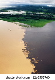 Meeting Of The Waters Of The Negro And Solimões Rivers In The City Of Manaus N Amazônia.