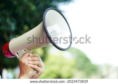 Megaphone for outdoor announcing. Concept : equipment for speaking to make louder in outdoor activities, camping, protesting, parade campaign or playing games. Bullhorn public address megaphone       