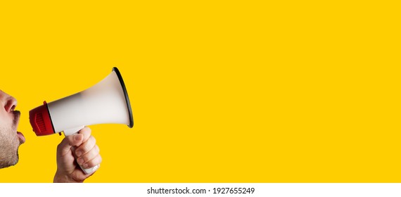 megaphone speaking announcing against isolated on yellow solid background - Powered by Shutterstock