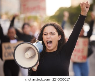 Megaphone, woman and people for gender equality, human rights or justice with freedom of speech in city street. Vote, protest and Mexico girl in crowd with voice for politics, angry broadcast or news - Shutterstock ID 2240055017