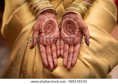 Mehendi Henna pattern on Malayalee bride at a wedding
