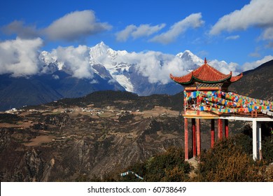 Meili Snow Mountain (Chinese: beautiful snowy range)  in the Chinese province of Yunnan. Because of restrictions and dangerous conditions, none of the major peaks in the range have ever been summited.