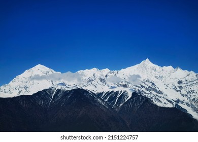 Meili Snow Mountain and Jiangjun peak in China