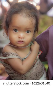 Mekong River, 2/28/2011: Portrait of a Cambodian infant child